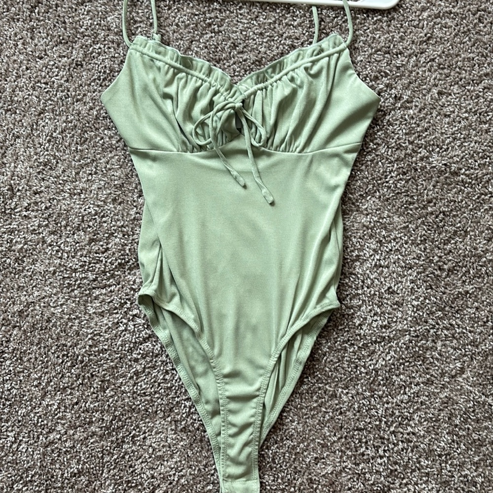 Green bodysuit